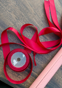 Red ribbon on a table