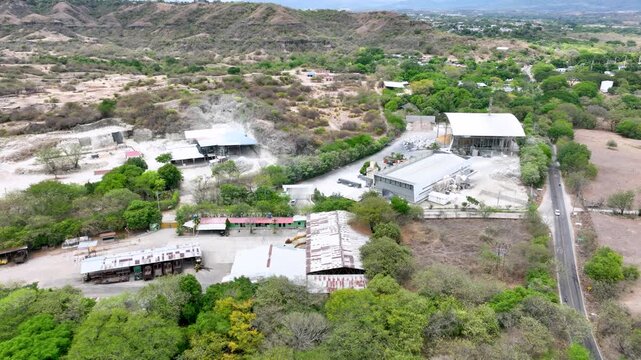 Pozos Tello Oil Production and Petroleum Infrastructure in Huila, Colombia. Establishing Shot. Aerial View.
