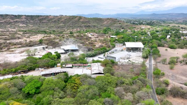 Tello Oil Field Petroleum Facilities in Huila, Colombia. Establishing Shot. Aerial View.