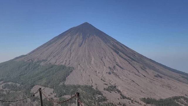 The volcano is cone-shaped. Footage of a perfectly shaped mountain: Mount Inerie.