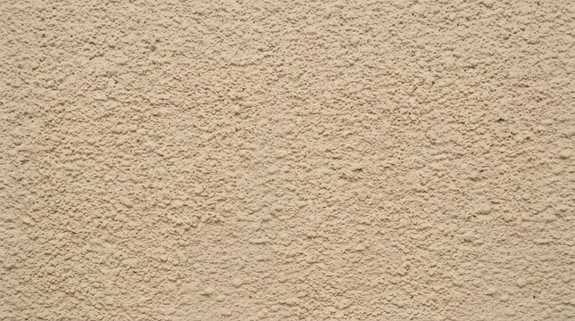 Beige textured stucco wall background, full frame rough plaster concrete surface texture, exterior architectural building facade pattern copy space.