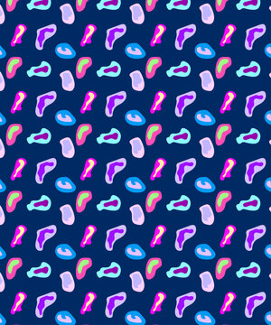 Colorful abstract seamless pattern with neon organic shapes on a dark blue background for modern textile and graphic design.