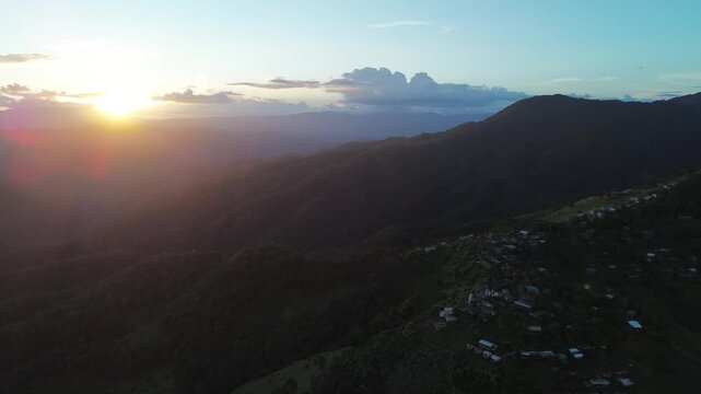 Sunset Mountain Landscape with Forest Ridge, Village Horizon, Golden Sunlight, Layered Cloud Valley, Peaceful Highland Ridge Panorama and Tranquil Evening View