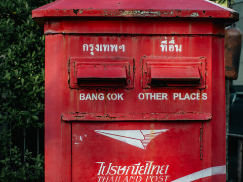 Weathered Red Thailand Post Mailbox with Bangkok and Other Places Slots, Vintage Postal Box Detail