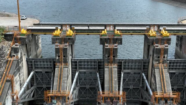 Betania Dam Spillway and Hydroelectric Infrastructure in Huila, Colombia. Establishing Shot. Aerial View.