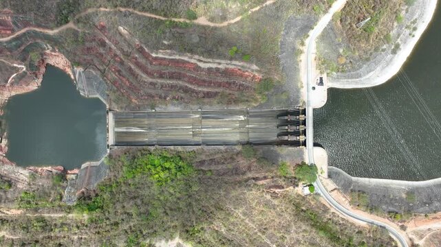 Betania Dam Spillway and Hydroelectric Infrastructure in Huila, Colombia. Establishing Shot. Aerial View.