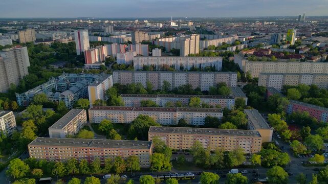 Sprawling urban landscape of residential prefabricated housing buildings, reflecting city planning and density. prefabricated housing. Spectacular aerial view drone panorama shot from above