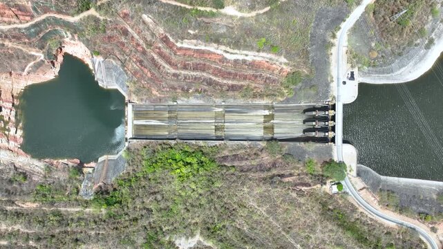 Betania Dam and Hydroelectric Reservoir in Huila, Colombia. Establishing Shot. Aerial View.