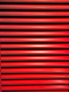 Abstract Red Horizontal Metallic Stripes Slatted Background
