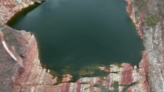 Betania Dam Spillway and Hydroelectric Infrastructure in Huila, Colombia. Establishing Shot. Aerial View.