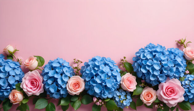 Beautiful blue hydrangea and pink rose flowers border on a soft pink background