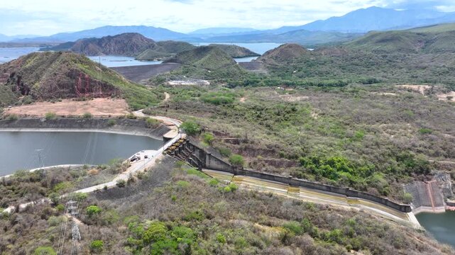 Betania Dam and Hydroelectric Reservoir in Huila, Colombia. Establishing Shot. Aerial View.