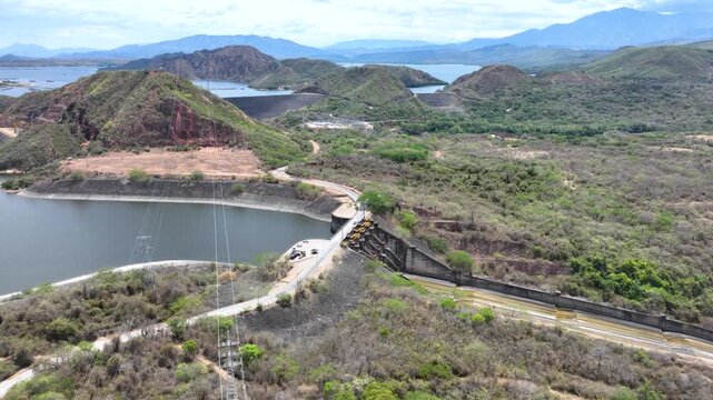 Betania Dam and Hydroelectric Reservoir in Huila, Colombia. Establishing Shot. Aerial View.