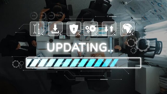 A team of professionals collaborates in a modern office environment, with a digital updating progress bar illustrating ongoing project enhancements and connectivity. Raster
