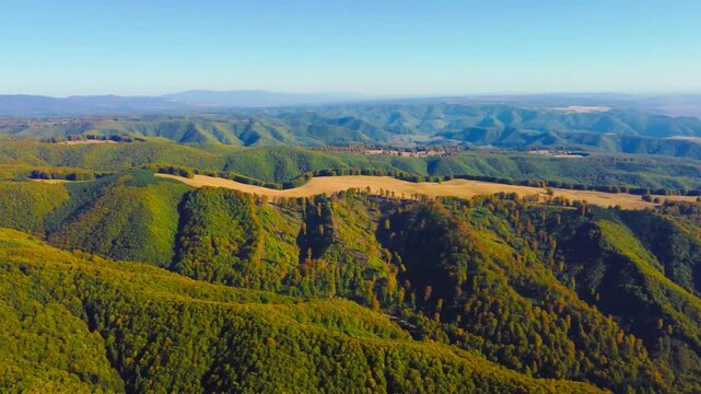 Aerial drone footage of the mountains in the area of ​​the Sovata resort, Romania, in autumn.