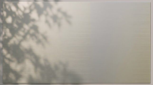 Brushed anodized aluminium sheet with fine linear grain and soft shadows, sleek textured backdrop for design