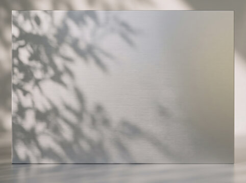 Brushed anodized aluminium sheet with fine linear grain and soft shadows, sleek textured backdrop for design