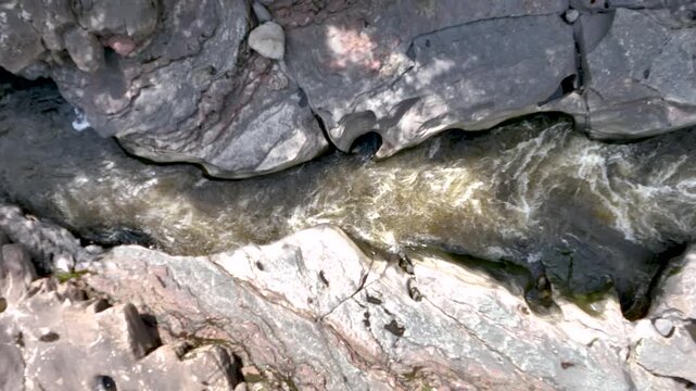 Magdalena River Flowing Through Estrecho del Magdalena Rock Formations in Colombia. Slow Motion. Establishing Shot. Aerial View.