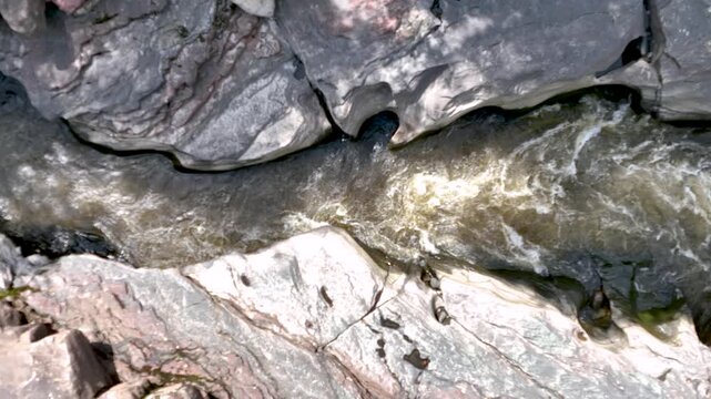 Magdalena River Flowing Through Estrecho del Magdalena Rock Formations in Colombia. Slow Motion. Establishing Shot. Aerial View.