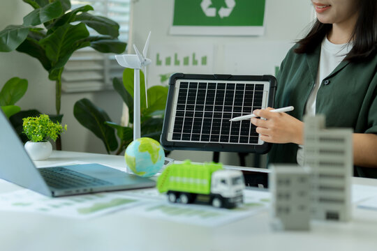 Businesswoman Presents Innovative Solar Panel Solutions and Renewable Energy Strategies to Lead Green Business Growth and Environmental Responsibility Sustainability Through Clean Energy