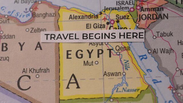 Travel Begins Here Paper Text Snippet on Map of Egypt for Vacation Planning