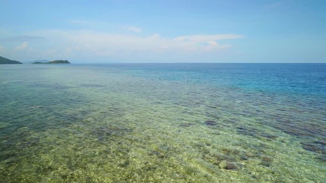 Crystal Clear Tropical Sea With Shallow Coral Reef 4K
