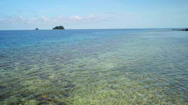 Calm Tropical Ocean With Transparent Shallow Water 4K