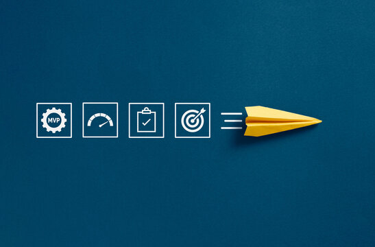 MVP product launch concept with paper airplane flying to target