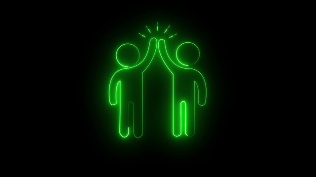 Glowing neon green icon of two stylized figure silhouettes celebrating with a high-five gesture and radiating sparks above their hands against a black background. Animated teamwork achievement.