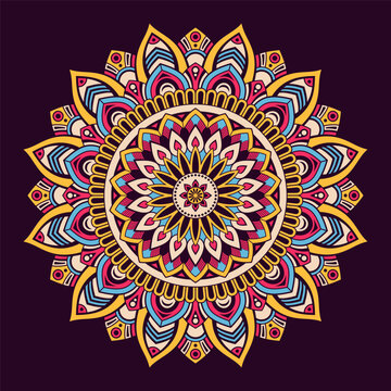 Floral vector mandala isolated on dark purple background. Vibrant multi-colored mandala. Symmetrical intricate ethnic vector ornament with yellow, blue, pink geometric patterns. Vector illustration.