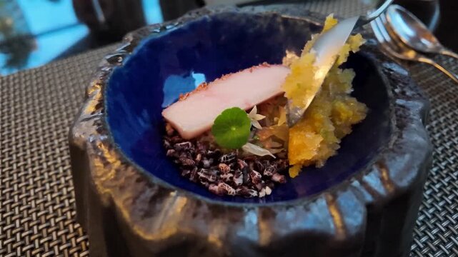 Serving Gourmet Dish with Raw Fish Berry Rice and Pomelo Salad