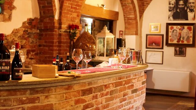 Rustic Wine Tasting Room with Brick Counter and Bottles