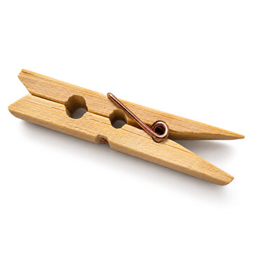Single wooden clothespin isolated on a white background
