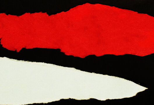 Torn paper isolated on black background. Red and White ripped paper texture  backdrop with copy space fot text message. Blank banner frame border