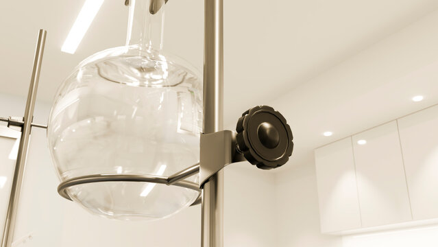 Round bottom flask held by clamp stand in laboratory setting