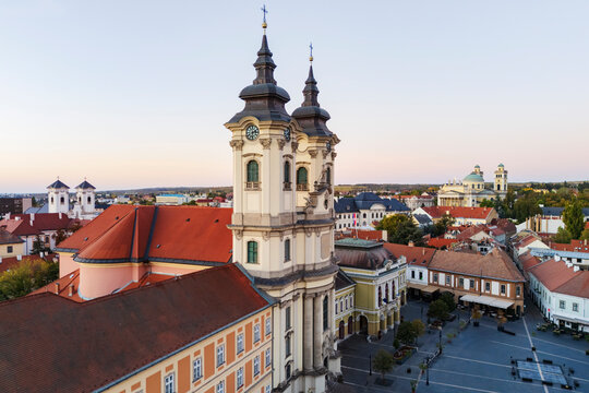 Minorite Church and Dob&oacute; Square at dawn in eger Hungary cityscape