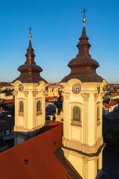 Minorite Church towers with clocks in eger, Hungary cityscape