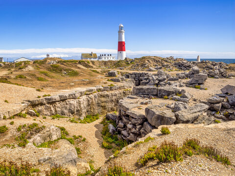Portland Bill Lighthouse and the 19th Century Bill Quarries on a Beautiful Early Autumn Day with Clear Blue Sky