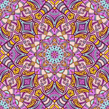 Seamless vibrant mandala vector pattern with intricate floral and geometric ornaments in bright pastel colors. Decorative boho ethnic vector color background for textiles, wallpaper, packaging.