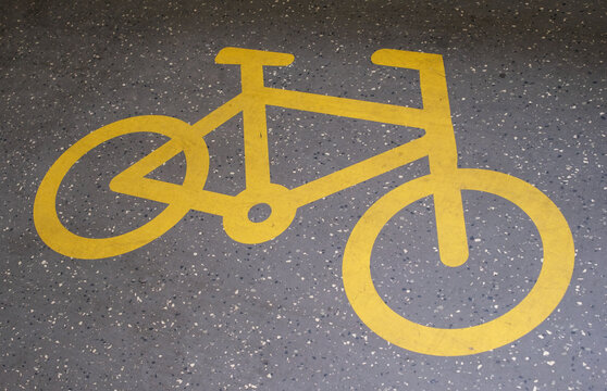 Yellow Bicycle Sign On Train Carriage Floor