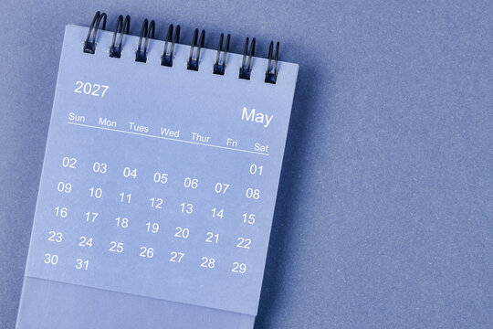 May 2027 Monthly desk calendar for 2026 year on blue background.