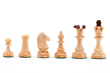 Chess pieces on a white background © Janusz