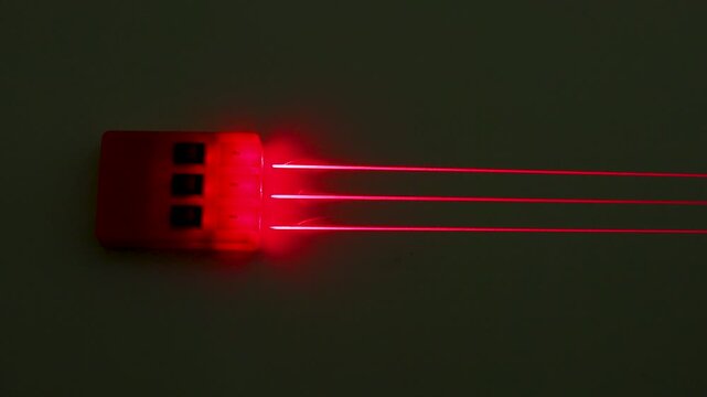 Red Laser Beam Refraction Physics Experiment with Convex Lens