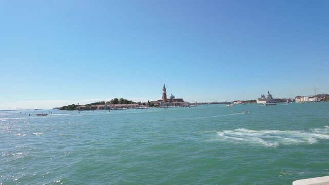 Venice Lagoon waters with ACTV ferry wake and San Giorgio