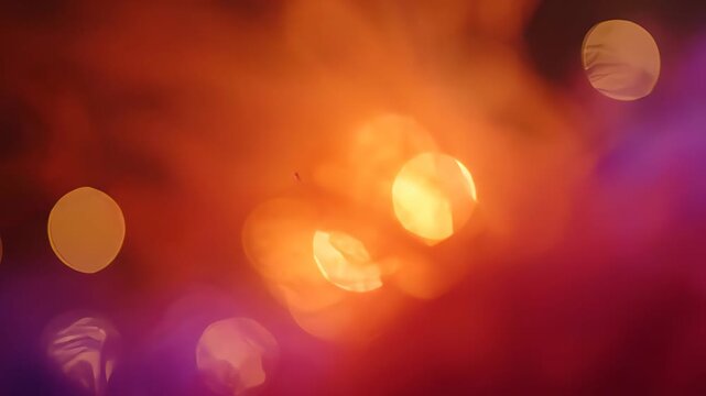 Abstract colorful light bokeh patterns with warm and cool glowing orbs