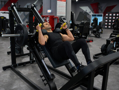 Man doing hack squat