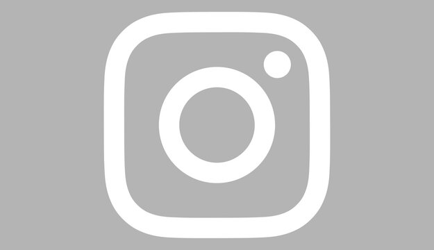 Instagram white logo icon for social media platform editorial.
