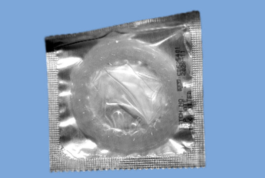 close up condom pack pixelate grayscale color halftone dotted texture style collage element isolated on blue background
