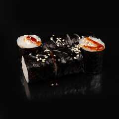 Gourmet Eel Sushi Rolls with Cream Cheese, Sauce, and Sesame Seeds © Дмитрий Ульянов