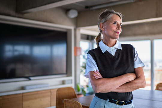 Businesswoman envisions success in the modern conference room